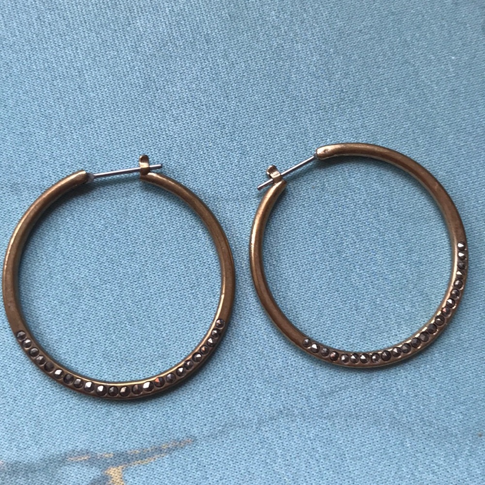 Small gold hoops with stud accents